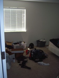At the end of the hall is the main bedroom. (Justin's still unpacking, and we need to get him a dresser.)